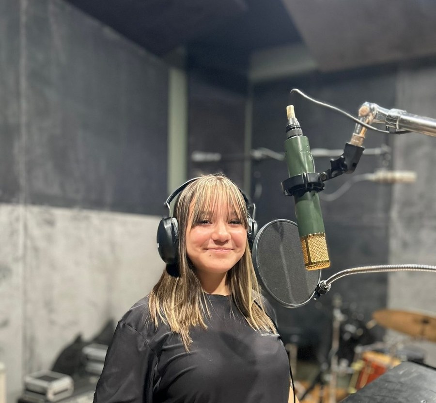 A Sound Birth student recording vocals in the studio